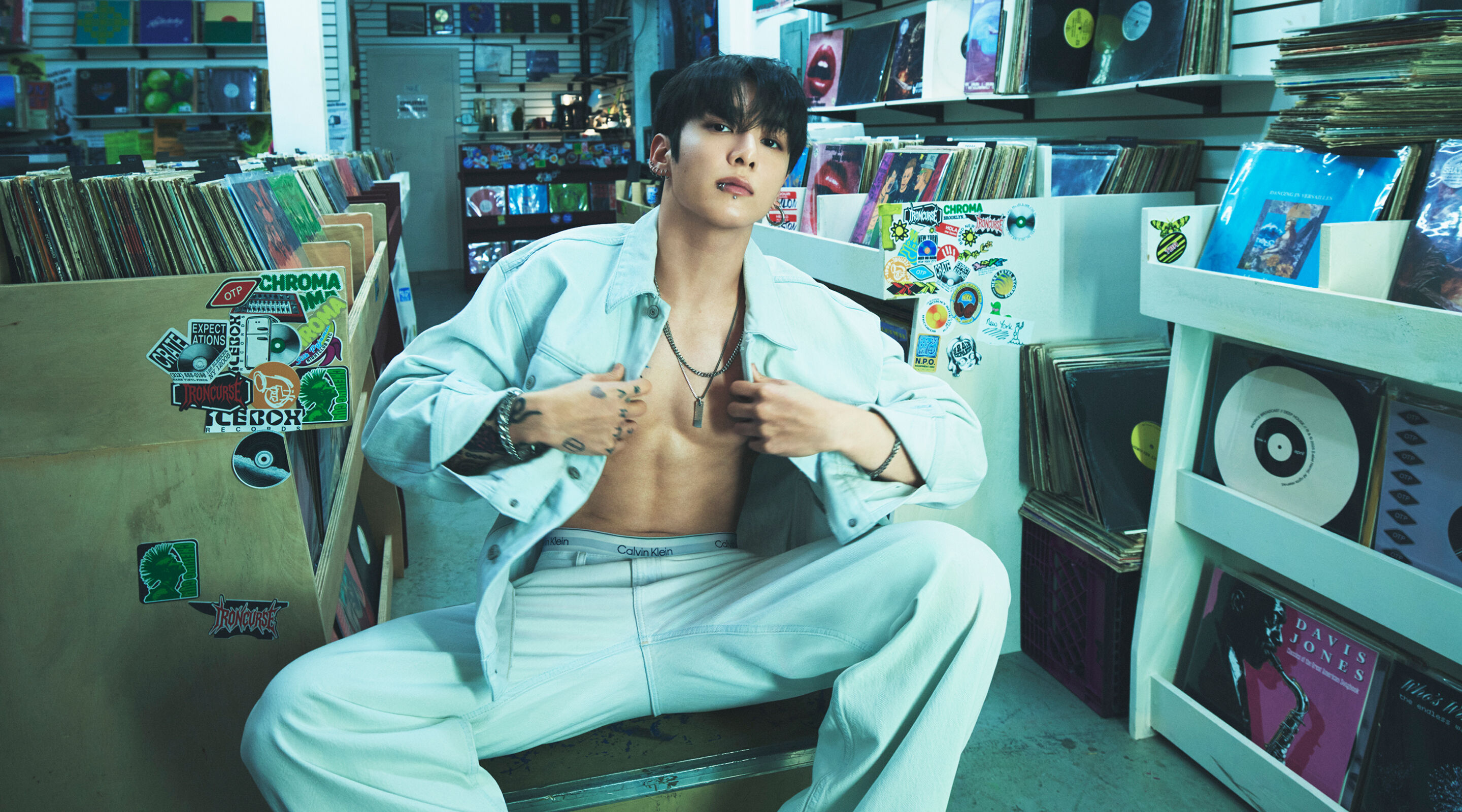 Calvin Klein Jung Kook Goes Baggy Living for bleached out denim. A look for the record.